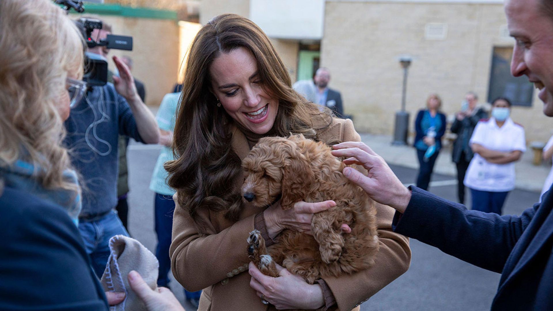 Kate Middleton and Prince William meet therapy puppy at Lancashire hospital - best photos