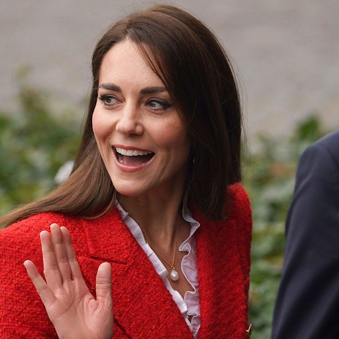 Kate Middleton giggles as she shoots out of children's slide on Denmark ...
