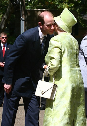 Prince Edward and Queen kiss