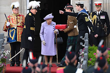 The Queen in high spirits at armed forces parade on public outing in ...