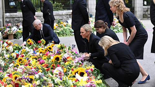 Princess Eugenie and Zara Tindall shed tears as they view floral tributes for the Queen