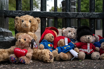 TrivDaily - Queen Consort Camilla surrounded by tributes to late Queen in new photo from family home 56 paddington-bear-tributes