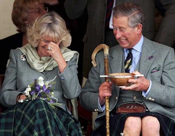 Charles and Camilla are laughing
