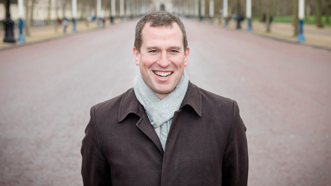 peter phillips pictured smiling as he stands on the mall in london