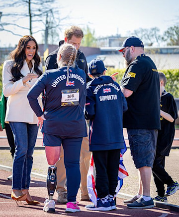 Prince Harry and Meghan Markle talk to competitors at Invictus Games event