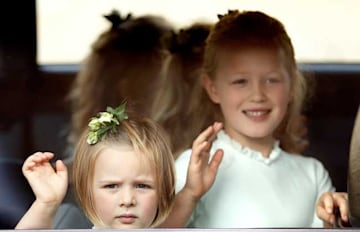 Mia Tindall waves with cousin Savannah Phillips at Princess Eugenie's wedding