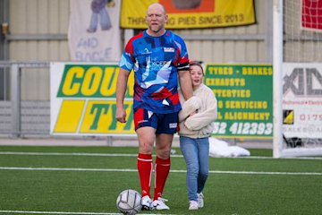 Mike and Mia Tindall play football in 2022