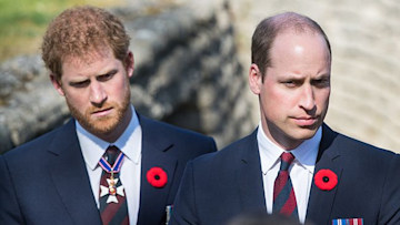 Prince William and Prince Harry standing side by side