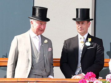 King Charles smiled with his younger brother Prince Edward