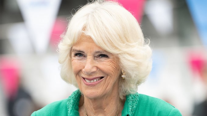 Queen Consort Camilla smiling in a close-up.