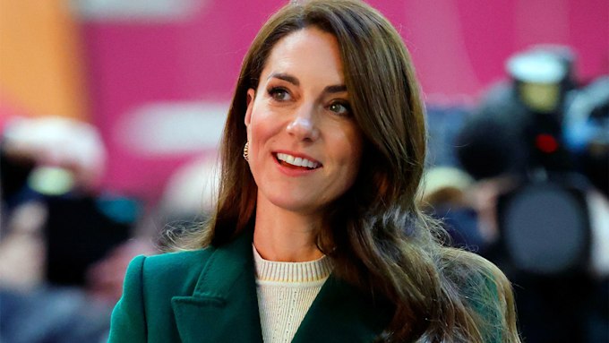 Kate Middleton smiling in close up photo.