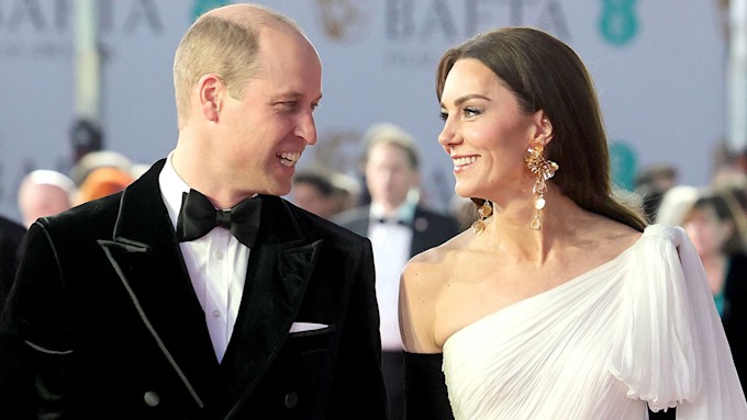 Prince and Princess of Wales smile at each other at BAFTAs