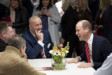 TrivDaily - Prince William and Princess Kate prepare to reignite friendly rivalry for latest outing 56 Prince William laughing with a group of people