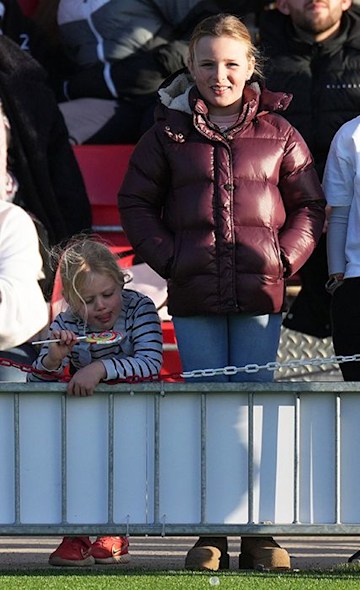 TrivDaily - Zara and Mike Tindall's daughter Mia reaches major new milestone! 55 mia tindall seen with pierced ears as she stands next to sister lena at charity football match