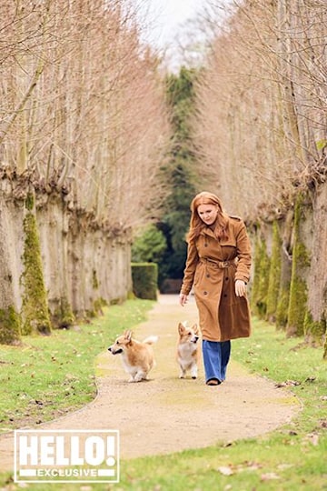 TrivDaily - Exclusive: Sarah Ferguson, Duchess of York gives insight into family life, the Queen and corgis 55 Sarah Ferguson walks the corgis in woodland on HELLO! shoot