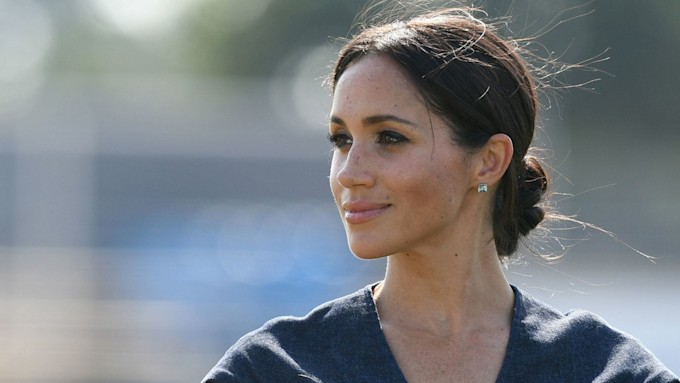 close up photo of meghan markle smiling