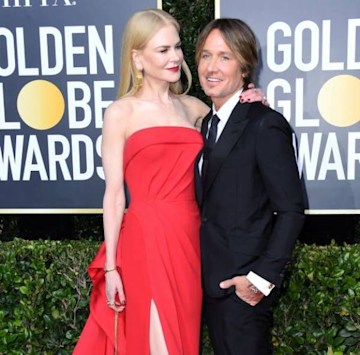 Nicole Kidman and Keith Urban hug on the red carpet